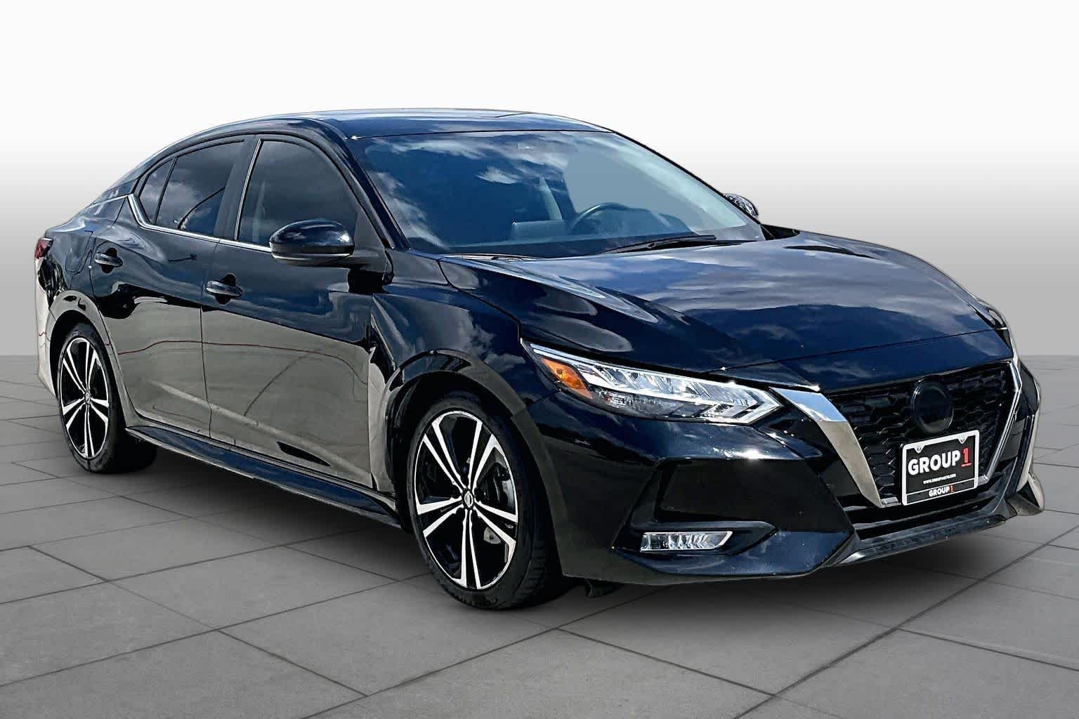 Used 2022 Super Black Nissan SR image 3