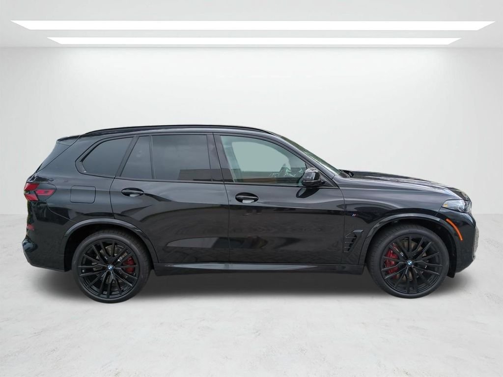New 2026 Black Sapphire Metallic BMW M60i image 3