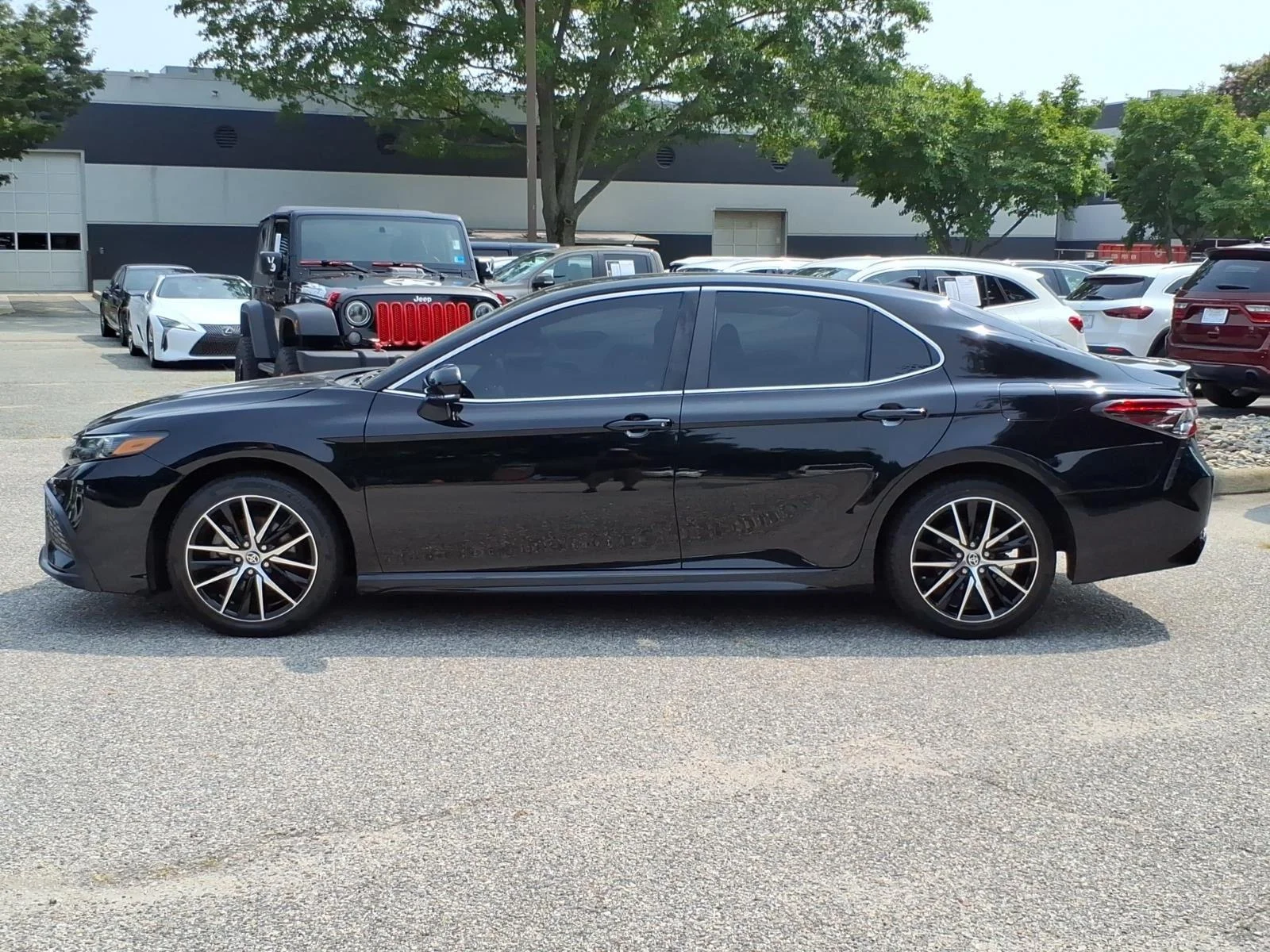 Used 2023 Midnight Black Metallic Toyota SE image 3
