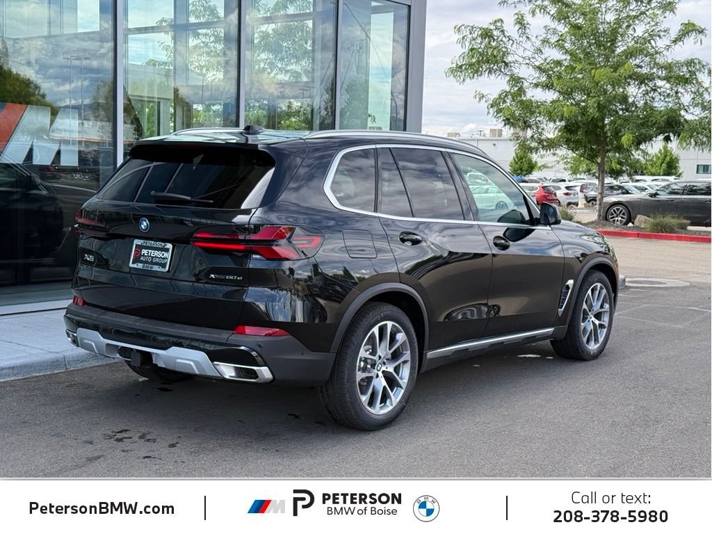 New 2026 Black Sapphire Metallic BMW xDrive50e image 5