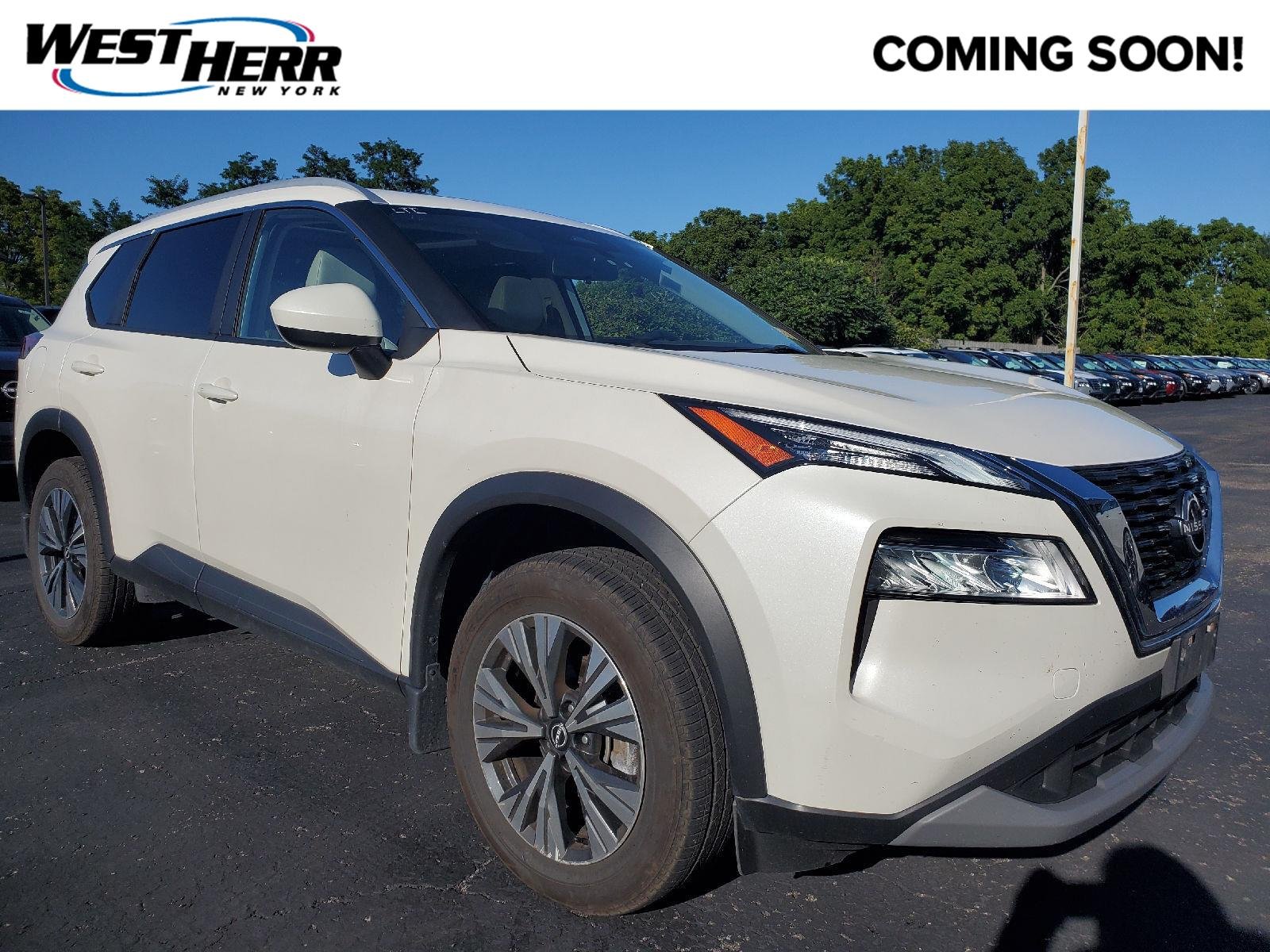 Used 2023 Pearl White Tricoat Nissan SV image 1
