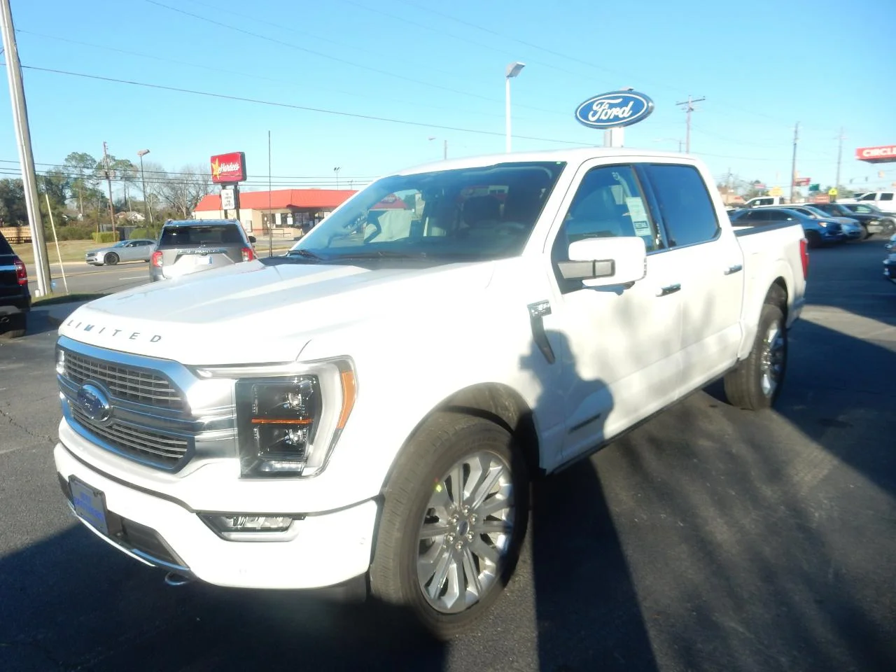 New 2023 Pearl White Ford LIMITED 4WD SUPERCREW 5.5 image 4