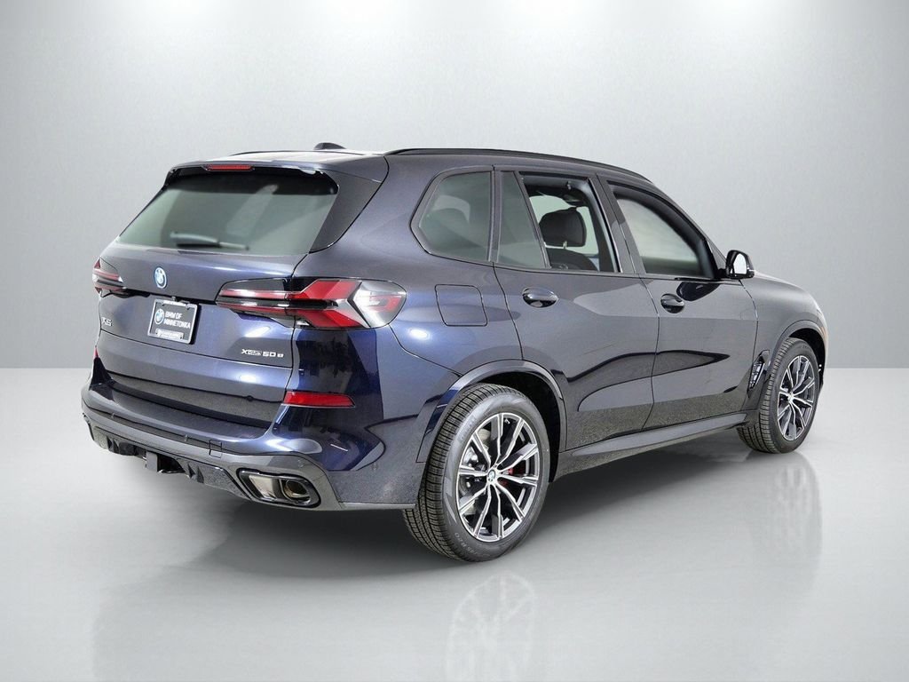 Used 2026 Carbon Black Metallic BMW xDrive50e image 10