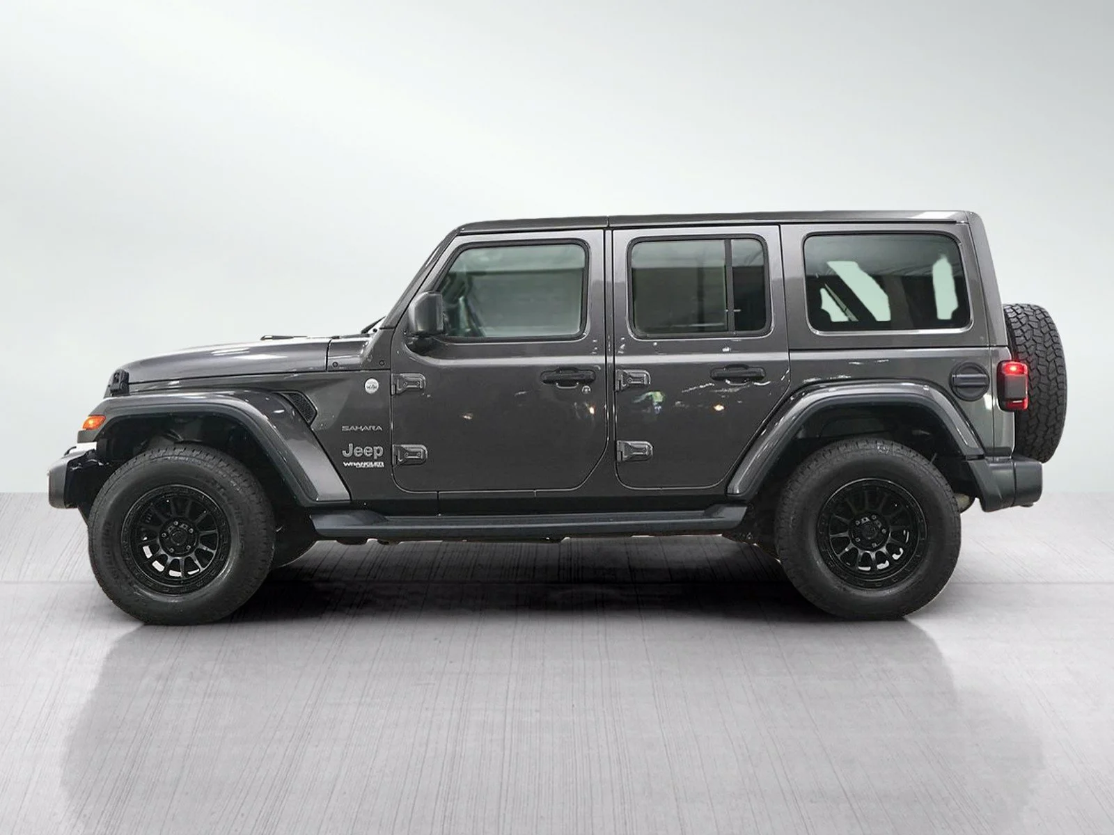 Used 2020 Jeep Wrangler Unlimited Sahara with VIN 1C4HJXEN6LW219009 for sale in Wayzata, Minnesota