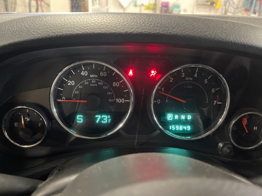 Used 2013 Black Jeep Unlimited Sport image 23