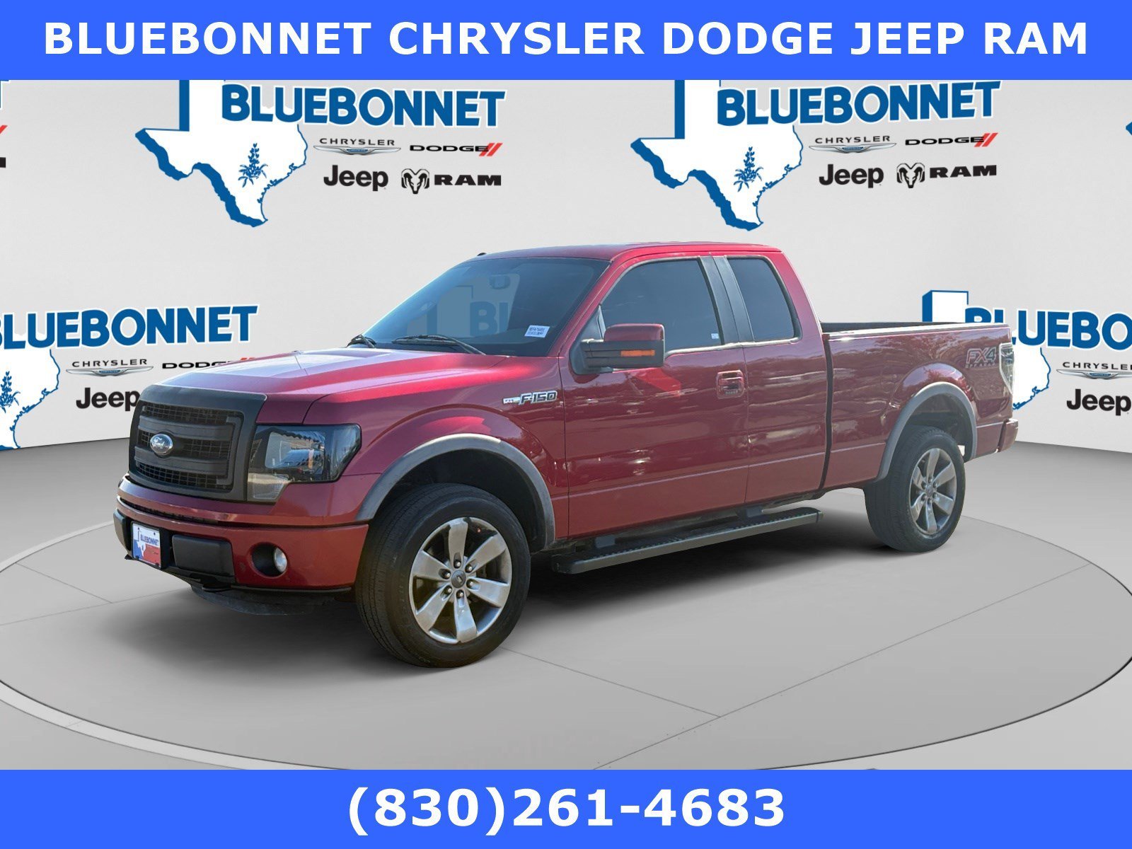 Used 2014 Ruby Red Metallic Ford FX4 image 1