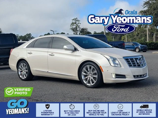 Used 2015 White Diamond Clearcoat Cadillac Luxury image 1