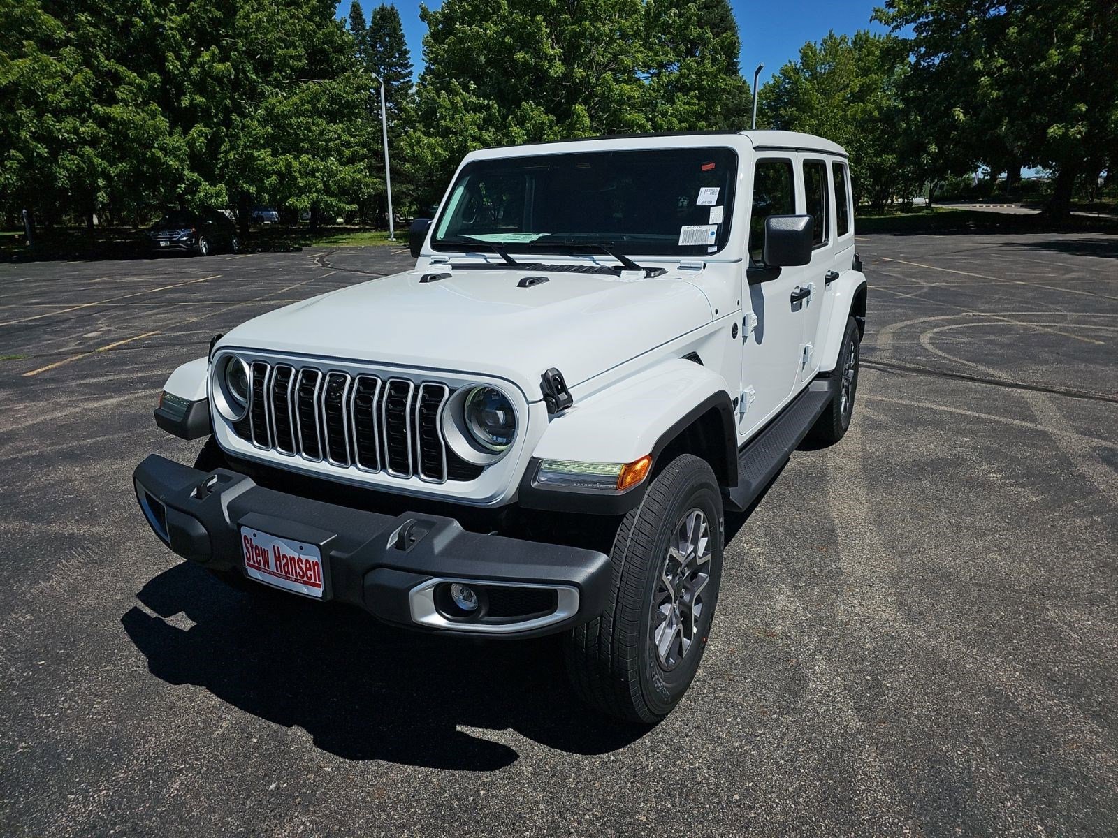 New 2026 Bright White Clearcoat Jeep Sahara image 1