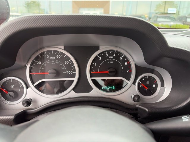 Used 2010 Red Jeep Sport image 2