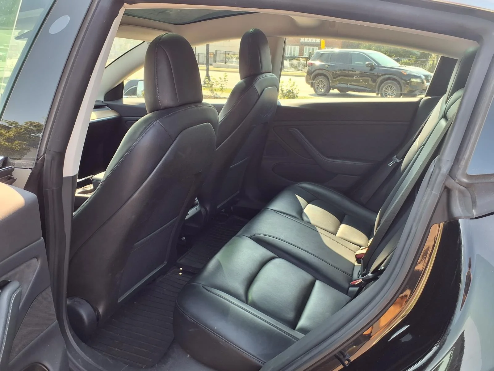 Used 2019 Solid Black Tesla Performance image 23