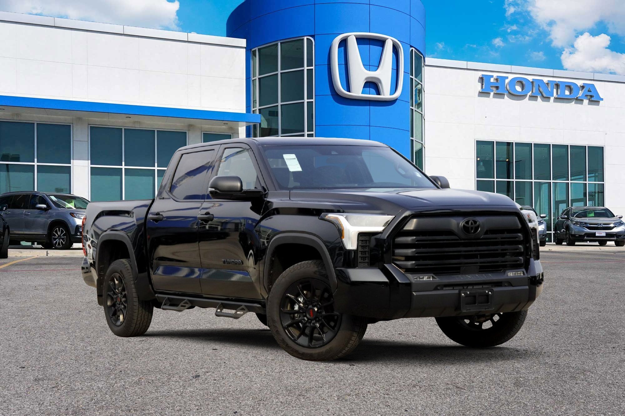 Used 2025 Midnight Black Metallic Toyota SR5 image 1