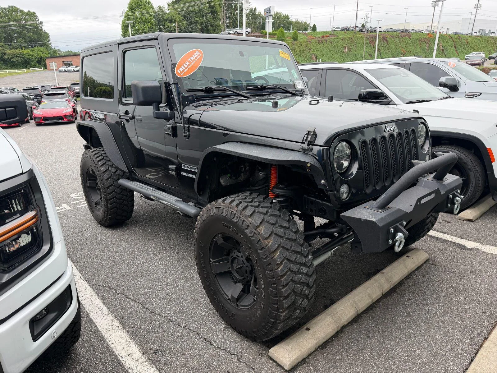 Used 2014 Black Clearcoat Jeep Sport image 2