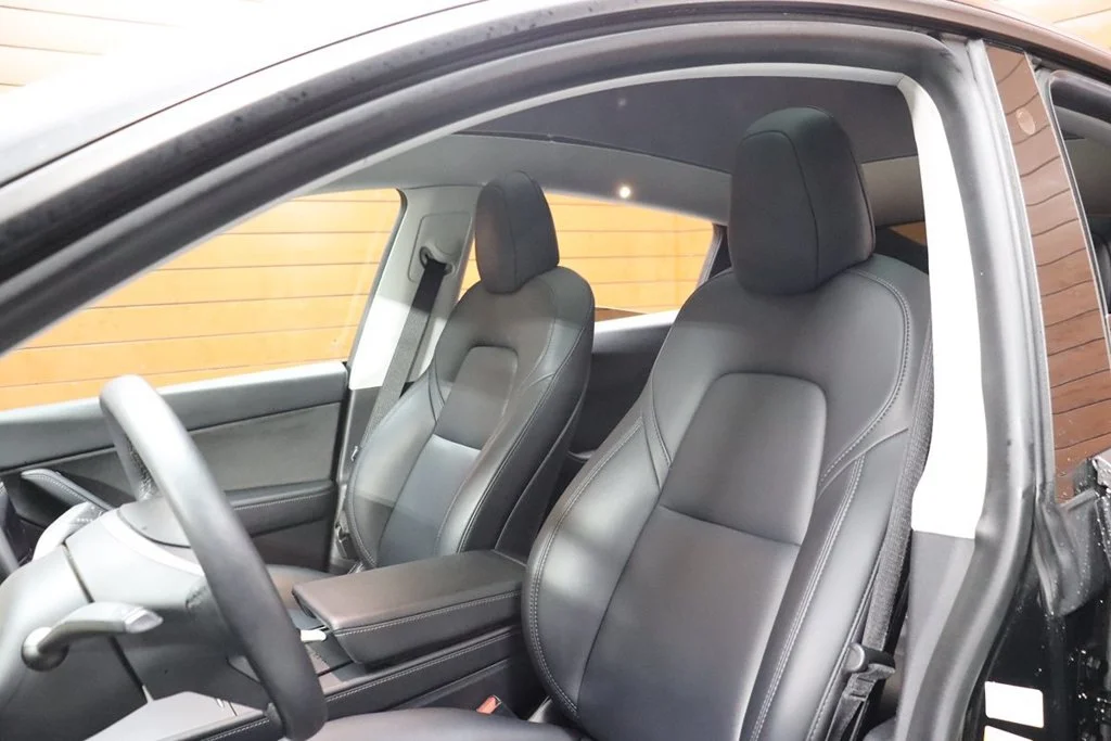 Used 2022 Solid Black Tesla Performance image 32
