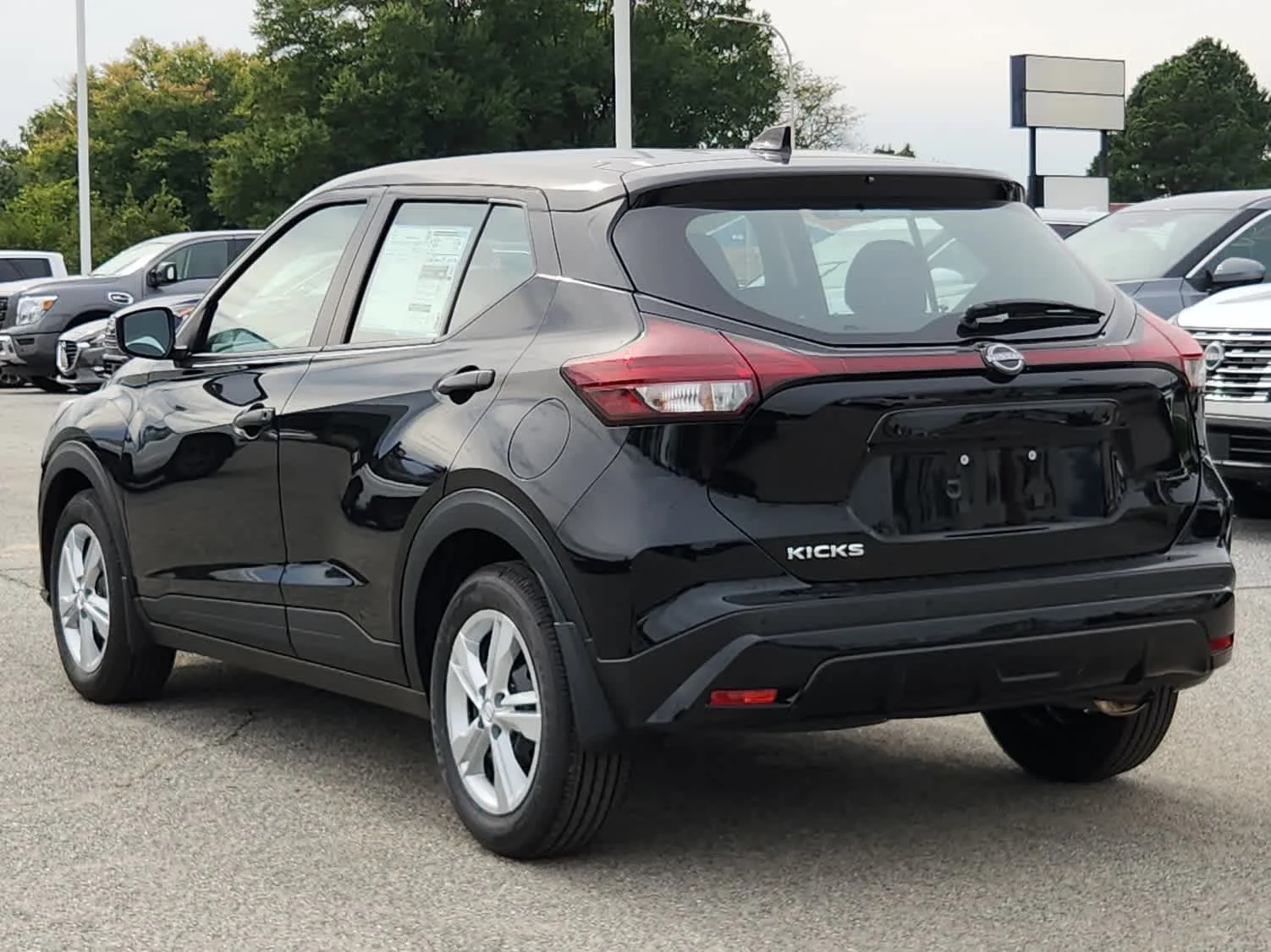 Certified Used 2025 Super Black Nissan S image 4