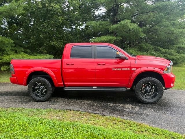 Used 2012 Flame Red Ram Sport image 2