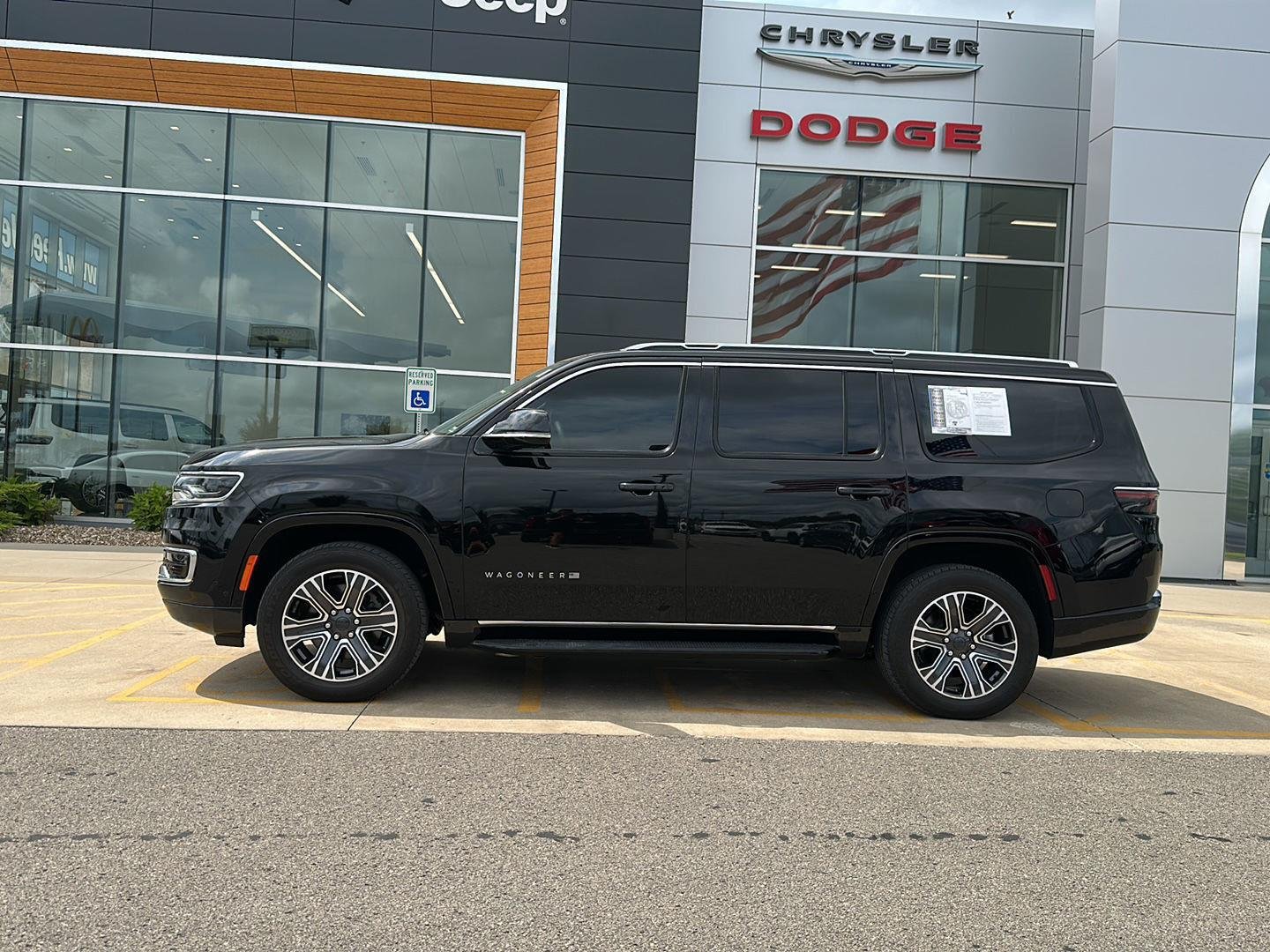 Used 2024 Diamond Black Crystal Pearlcoat Jeep Series II image 2