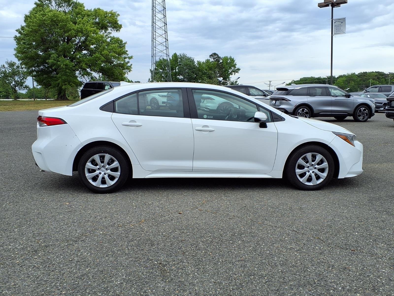Used 2024 Midnight Black Metallic Toyota LE image 10