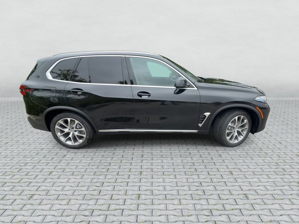New 2026 Black Sapphire Metallic BMW xDrive40i image 9
