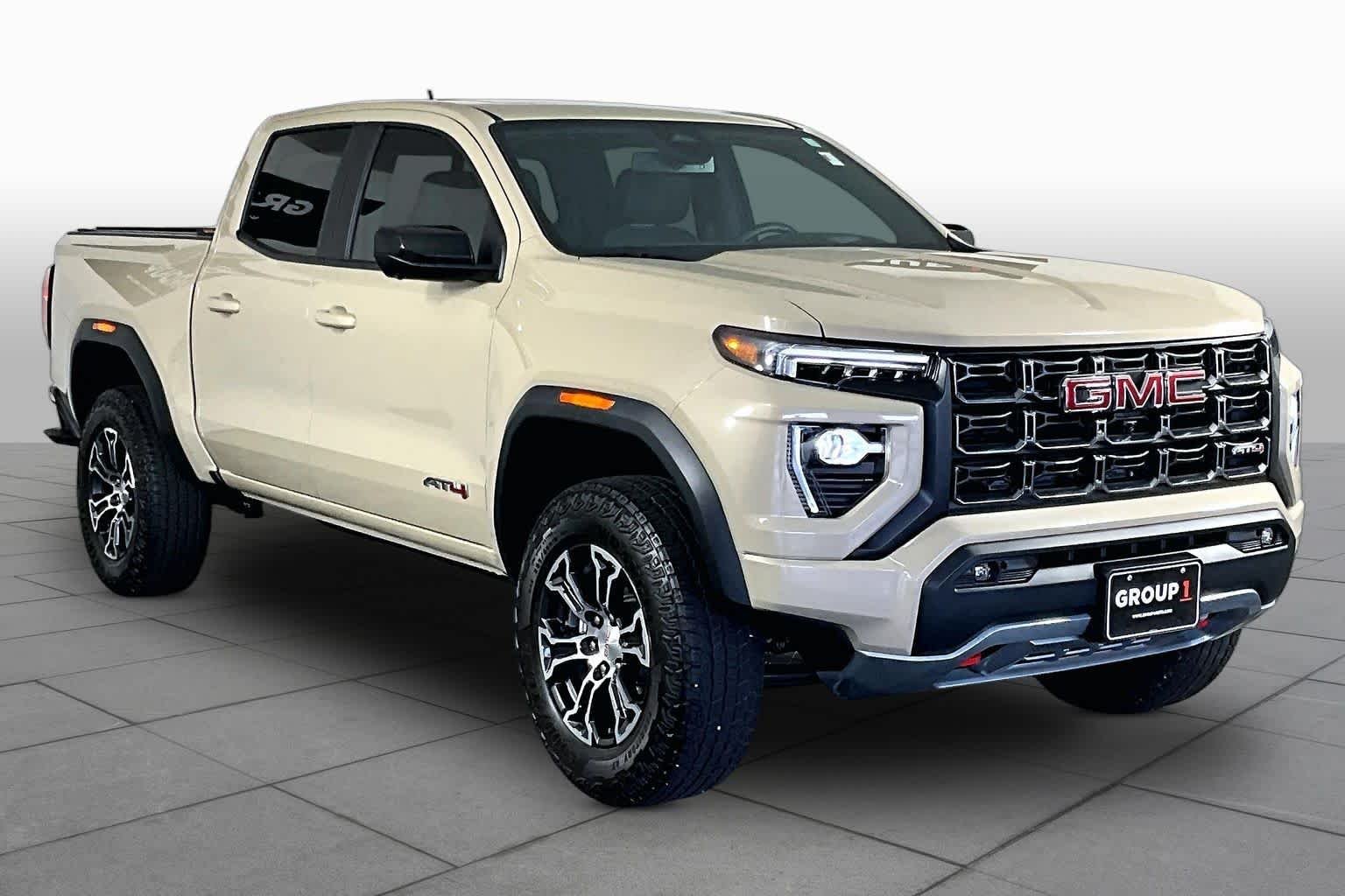 Used 2024 Desert Sand Metallic GMC 4WD AT4 image 3