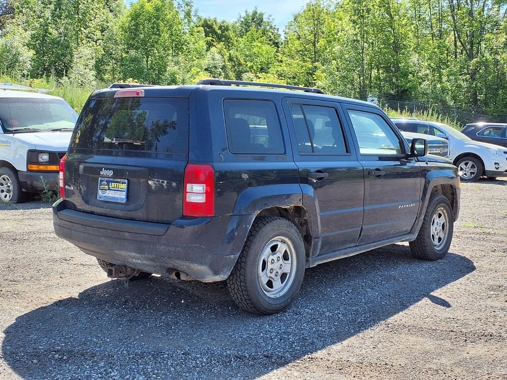 Used 2014 Blue Jeep Sport image 4