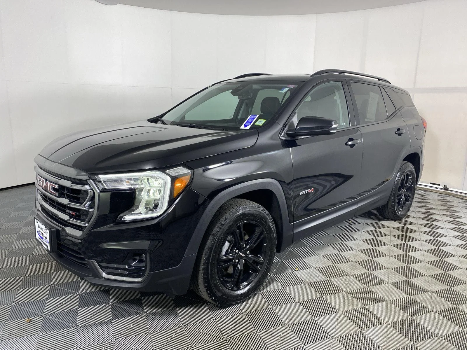 Used 2024 Ebony Twilight Metallic GMC AT4 image 12