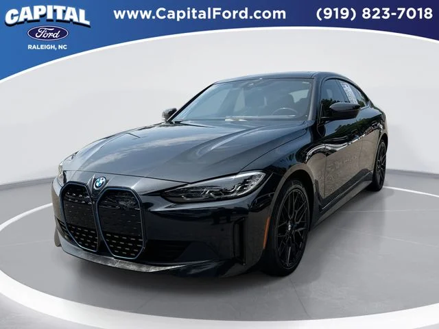 Used 2023 Black BMW eDrive40 image 1
