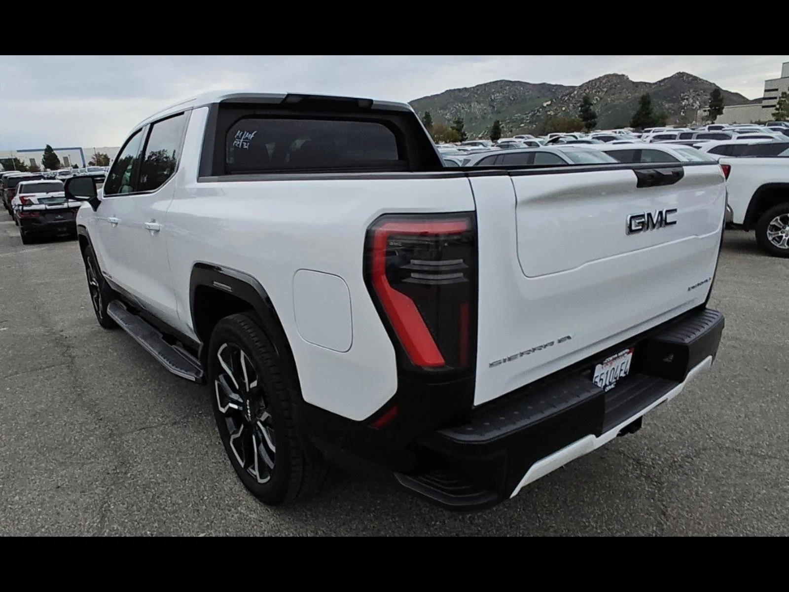 Used 2025 Summit White GMC Extended Range Denali image 7