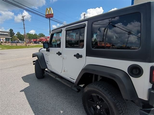 Used 2016 White Jeep Unlimited Sport image 8