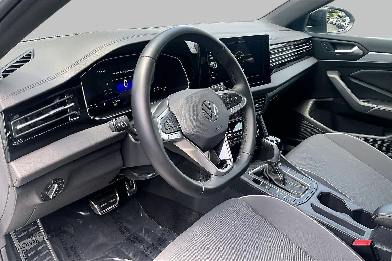 Certified Used 2025 Pure White Volkswagen Sport image 17