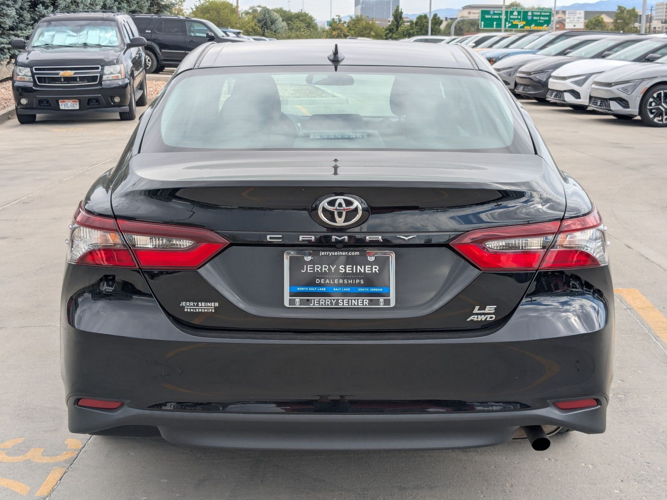 Used 2023 Midnight Black Metallic Toyota LE image 5