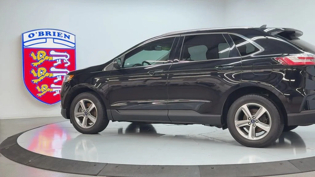 Used 2019 Agate Black Metallic Ford SEL image 7