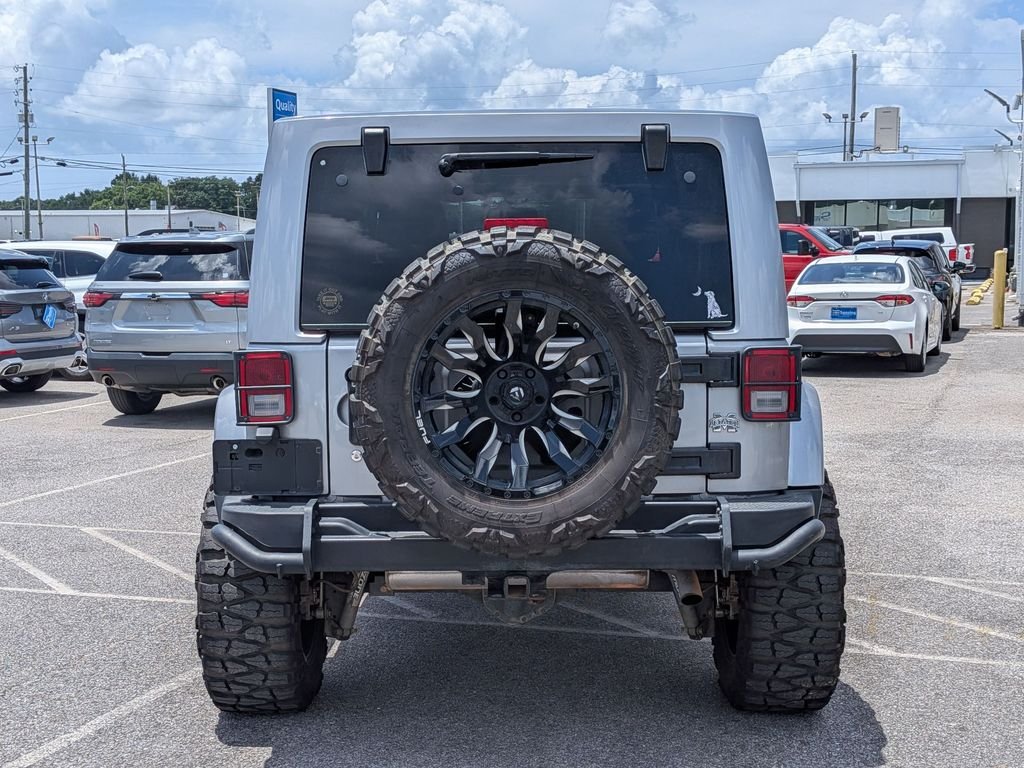Used 2017 Silver Jeep Unlimited Sahara image 4