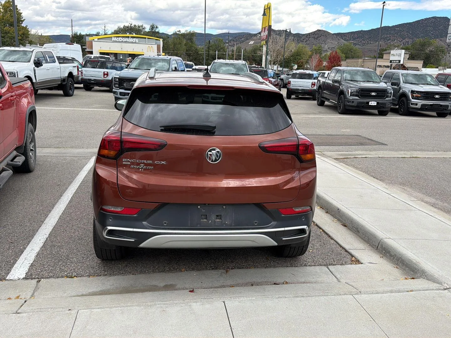 Used 2021 BURNISHED BRONZE METALLIC Buick Essence image 5