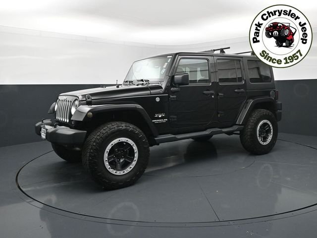 Used 2016 Jeep Wrangler Unlimited Sahara with VIN 1C4BJWEGXGL248196 for sale in Burnsville, Minnesota