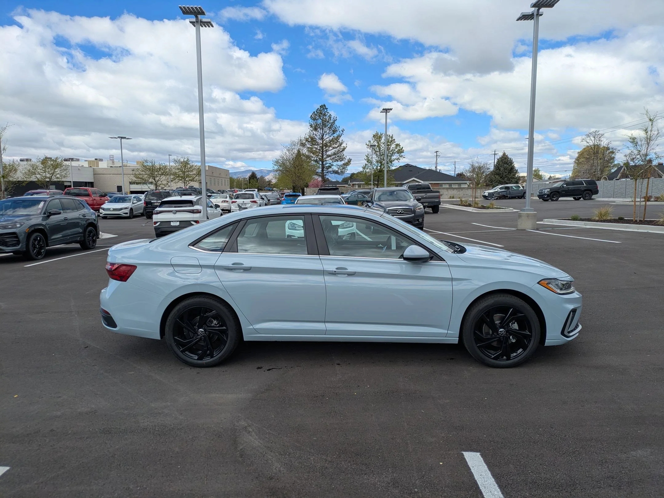 New 2026 Monument Gray Volkswagen SE image 2