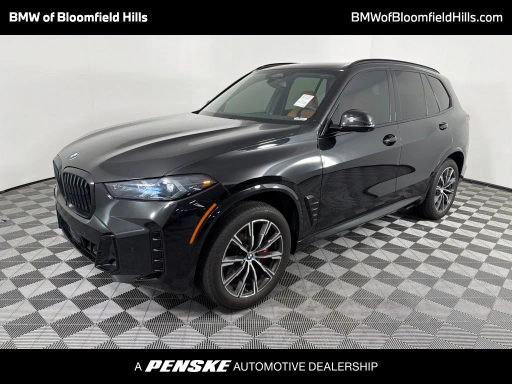 Certified Used 2024 Black Sapphire Metallic BMW xDrive40i image 1