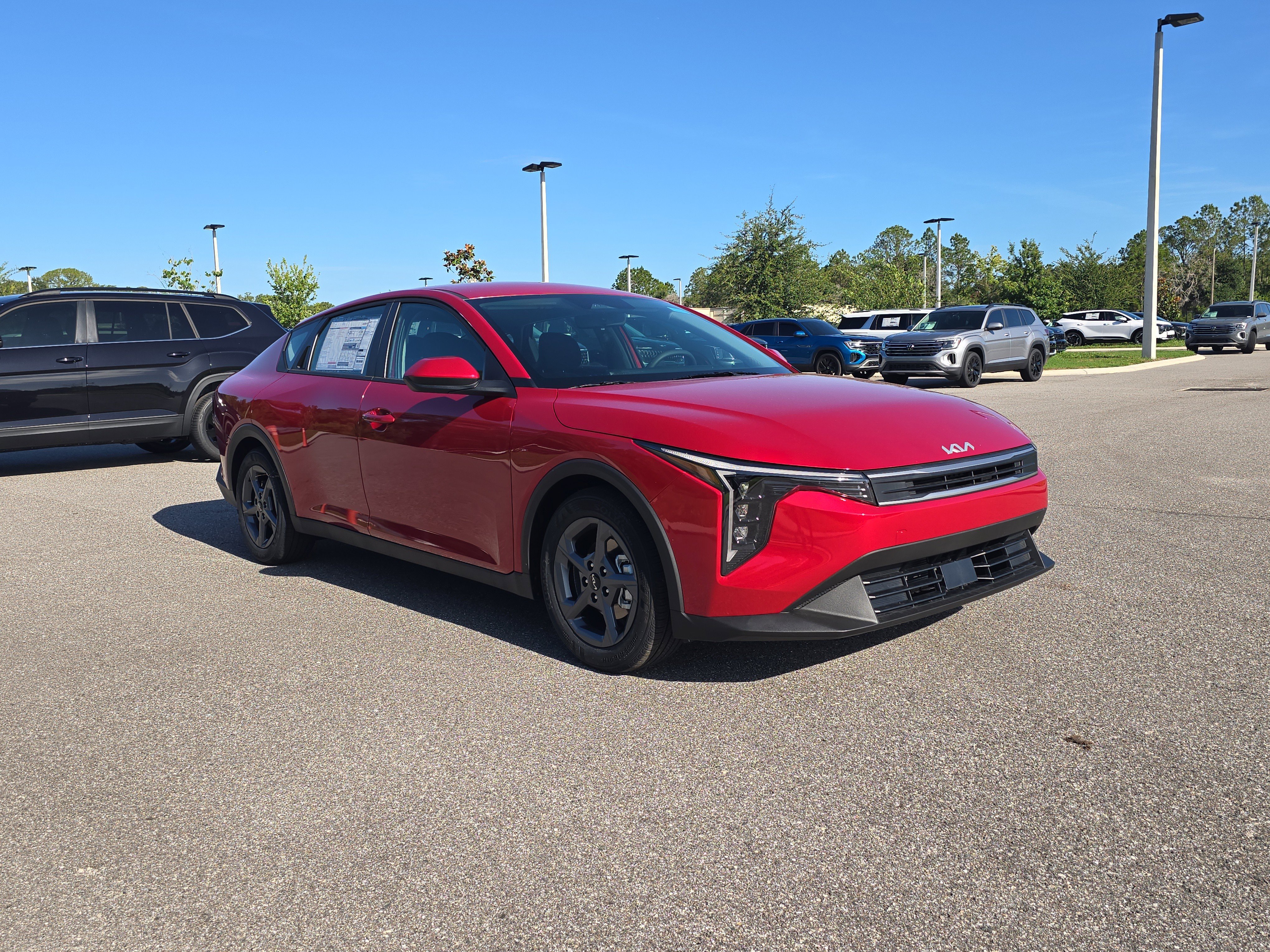 New 2026 Currant Red Kia LXS image 2