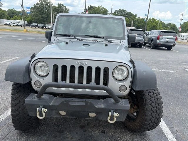 Used 2015 Silver Jeep Unlimited Sport image 2