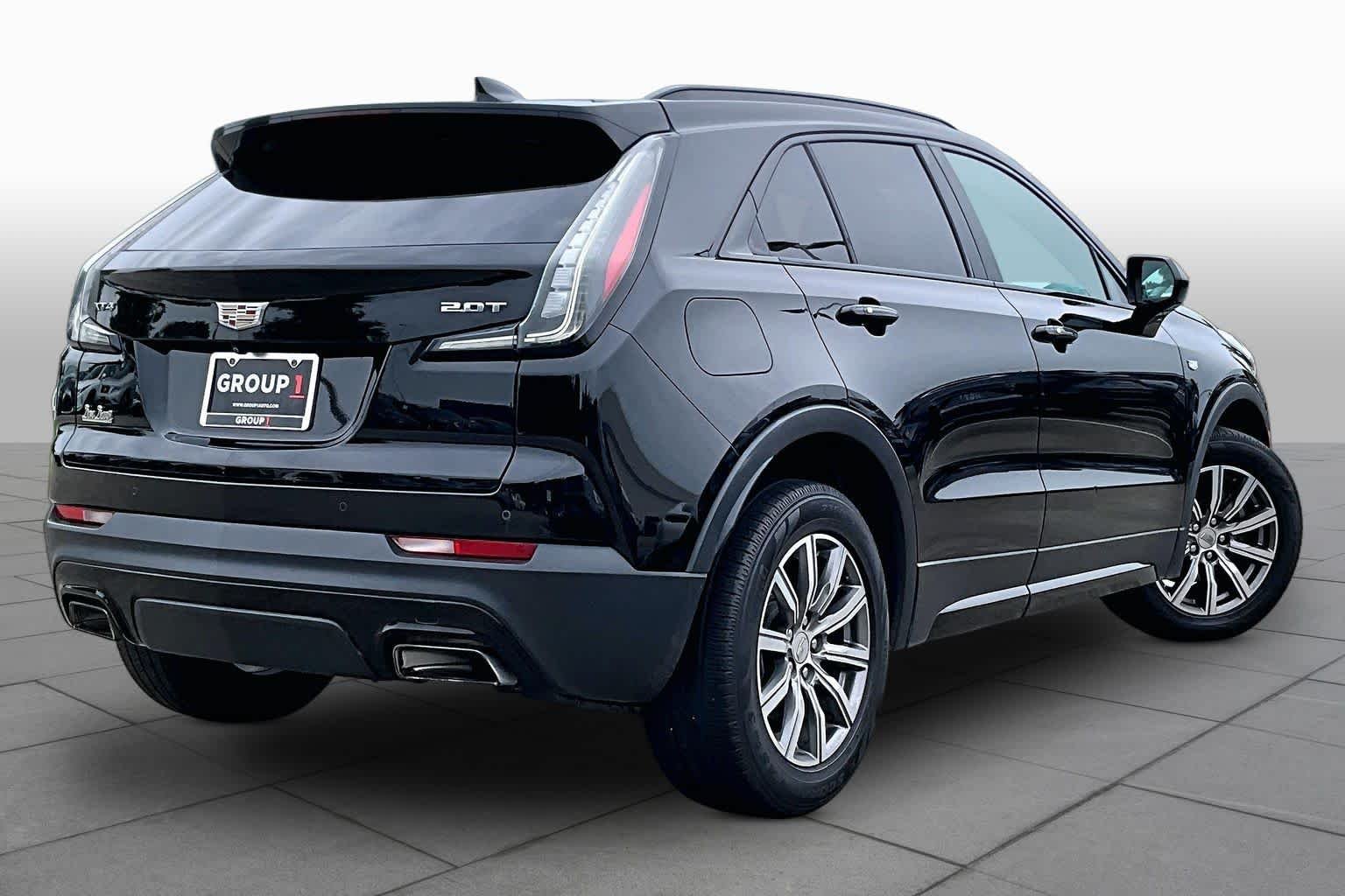 Used 2019 Stellar Black Metallic Cadillac FWD Sport image 12