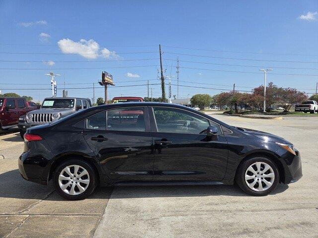 Used 2025 BLACK Toyota LE image 6