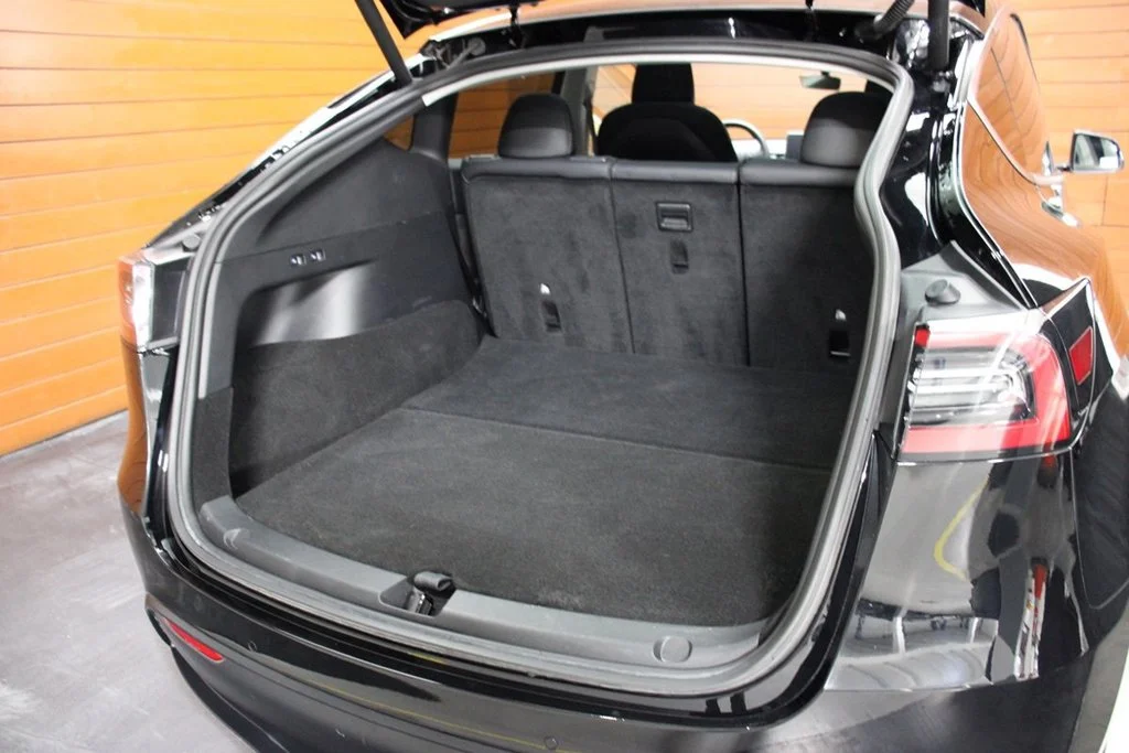 Used 2022 Solid Black Tesla Performance image 9