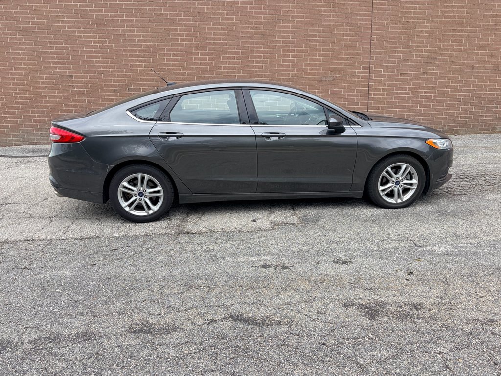 Used 2018 Magnetic Metallic Ford SE image 6