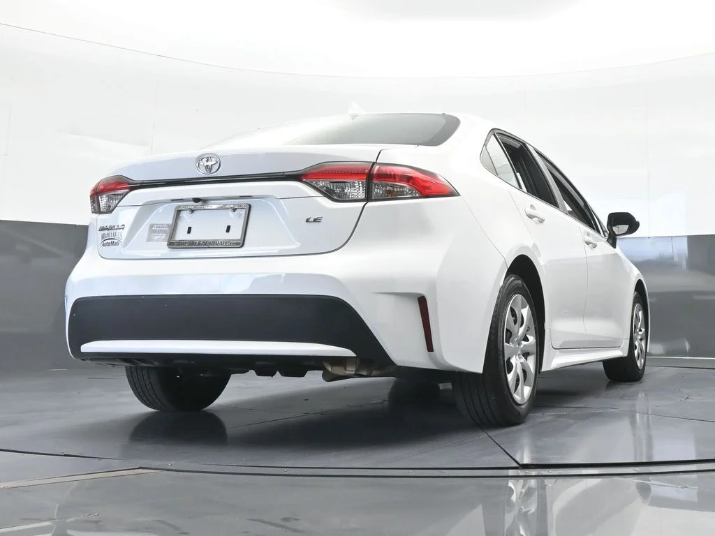 Used 2021 Super White Toyota LE image 48