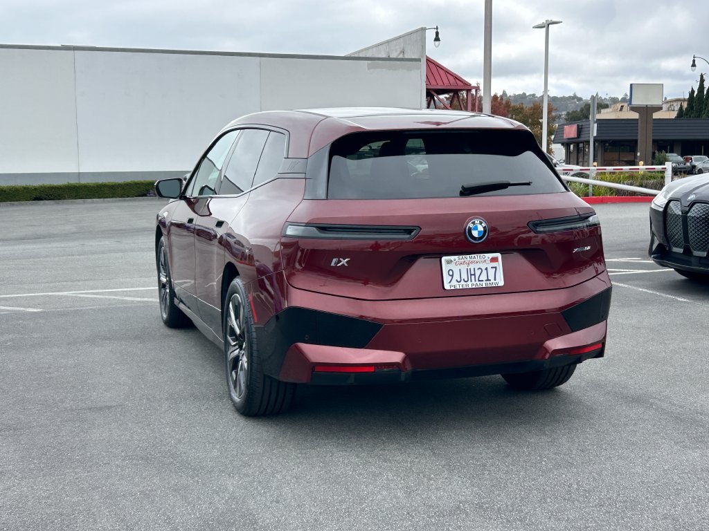Certified Used 2024 Red Metallic BMW xDrive50 image 3