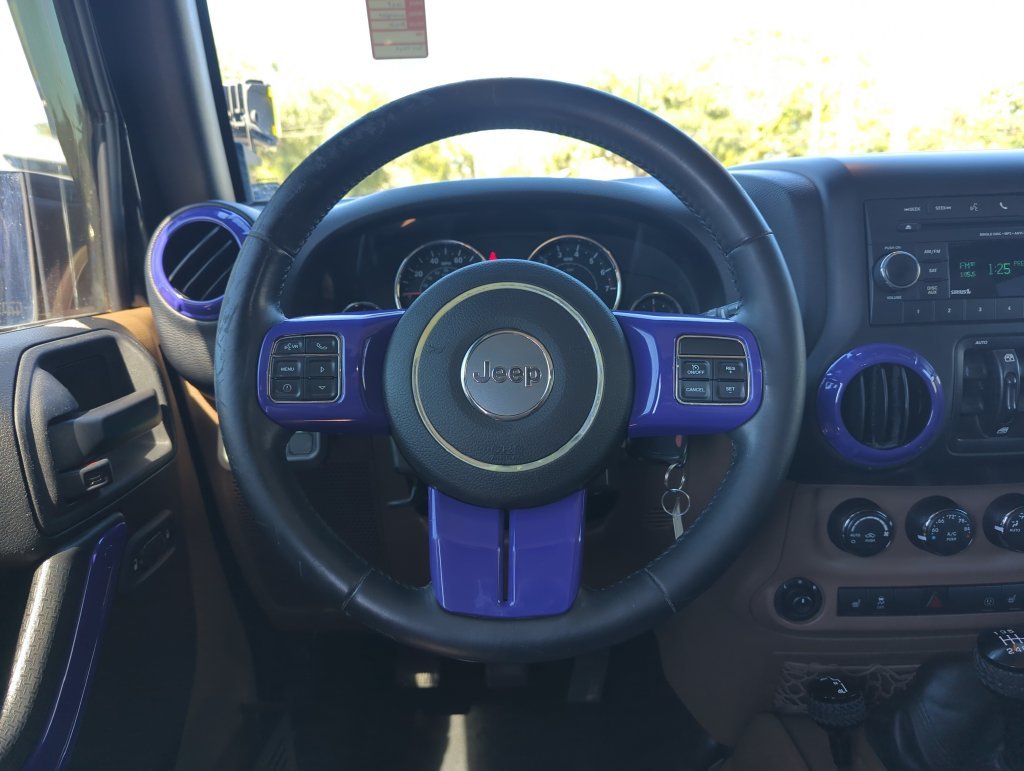 Used 2015 Black Jeep Unlimited Sahara image 17