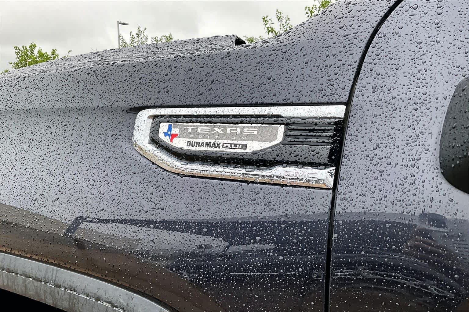 Used 2023 Titanium Rush Metallic GMC SLT image 33