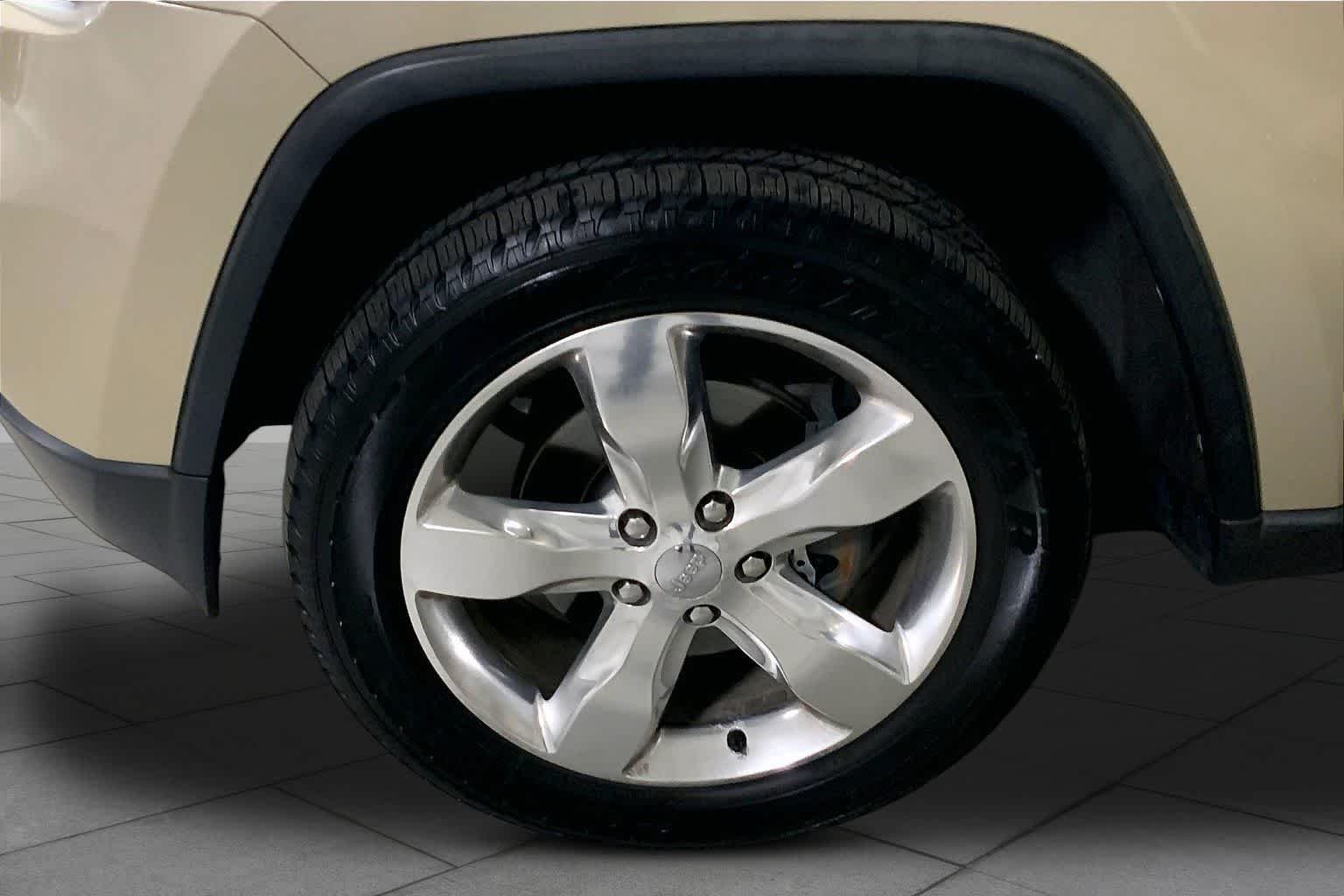Used 2011 White Gold Jeep Overland Summit image 10