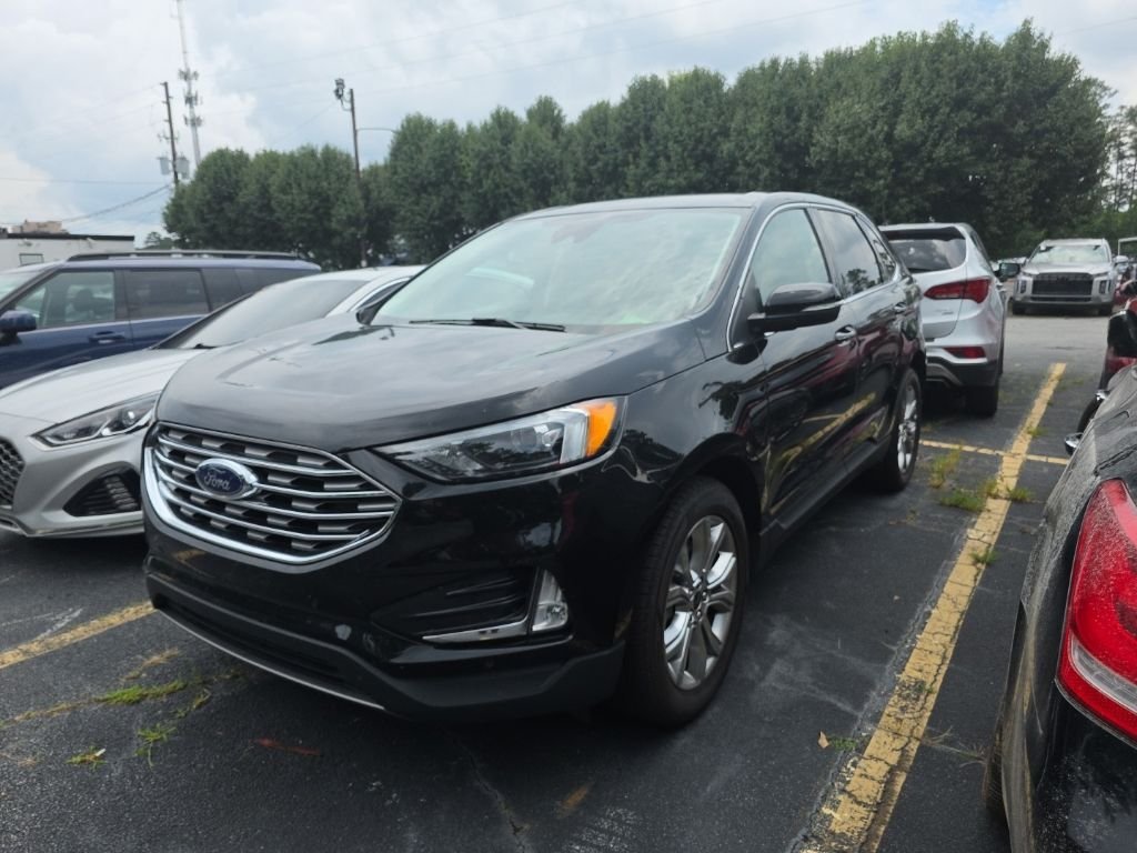 Used 2024 Black Ford Titanium image 1