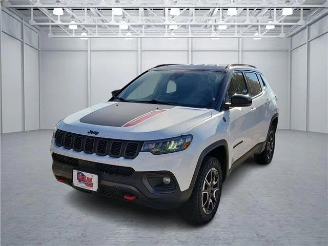 Used 2025 Bright White Clearcoat Jeep Trailhawk 4x4 image 1