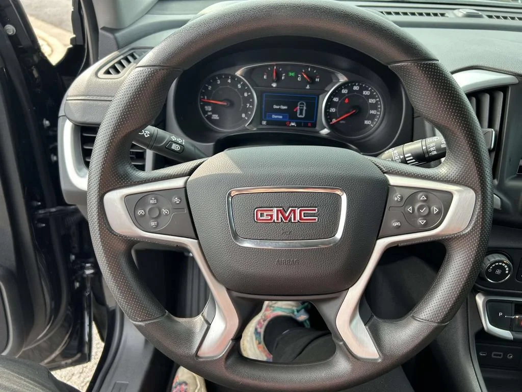Used 2024 Ebony Twilight Metallic GMC SLE image 25